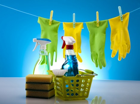 Professional cleaner preparing a property for one off cleaning in Ealing